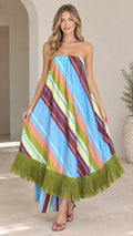 Front view of woman wearing sky blue multi striped strapless maxi dress with olive fringe hem