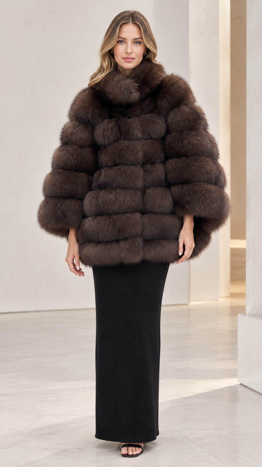 Front full view of woman wearing chocolate brown stand collar tiered faux fur cape coat
