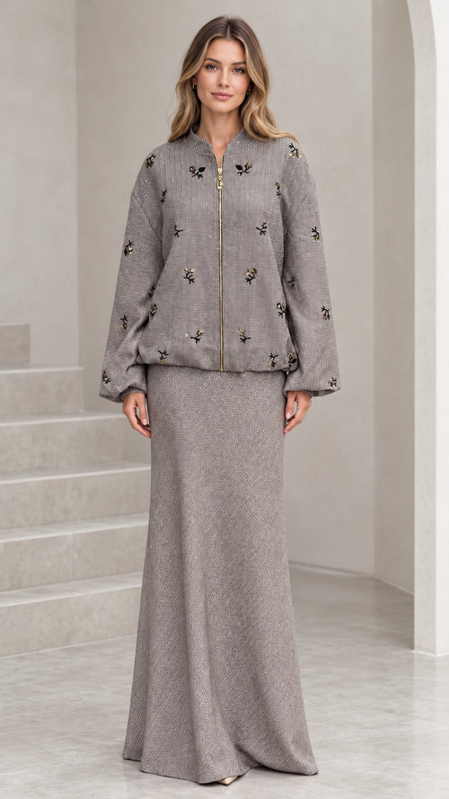 Front full view of grey beaded tweed bomber jacket and matching maxi skirt set