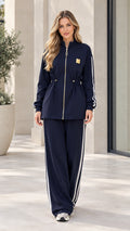 Women's navy blue zip-front drawstring tracksuit set front view