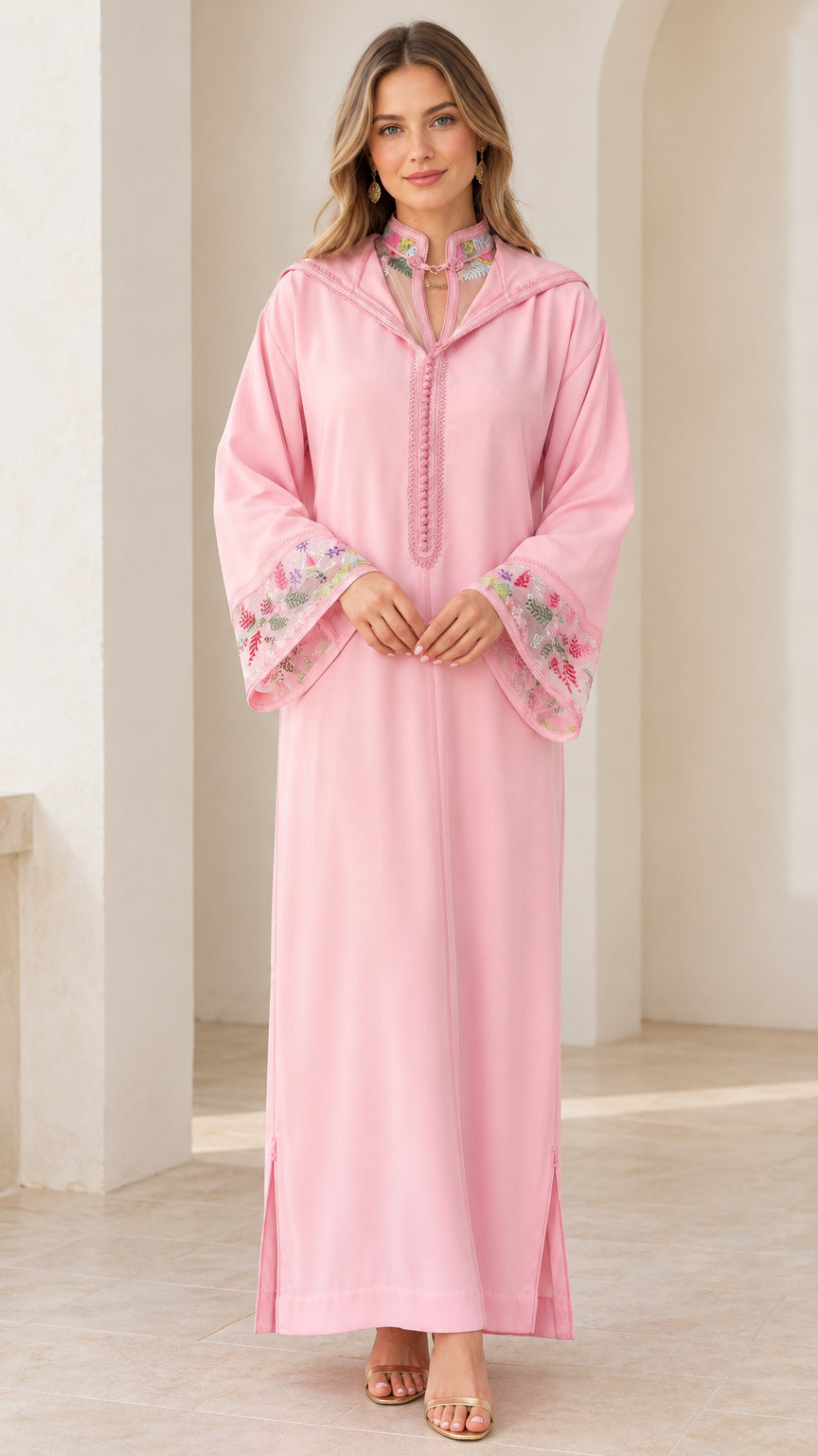 Full front view of model wearing pink embroidered hooded djellaba maxi dress