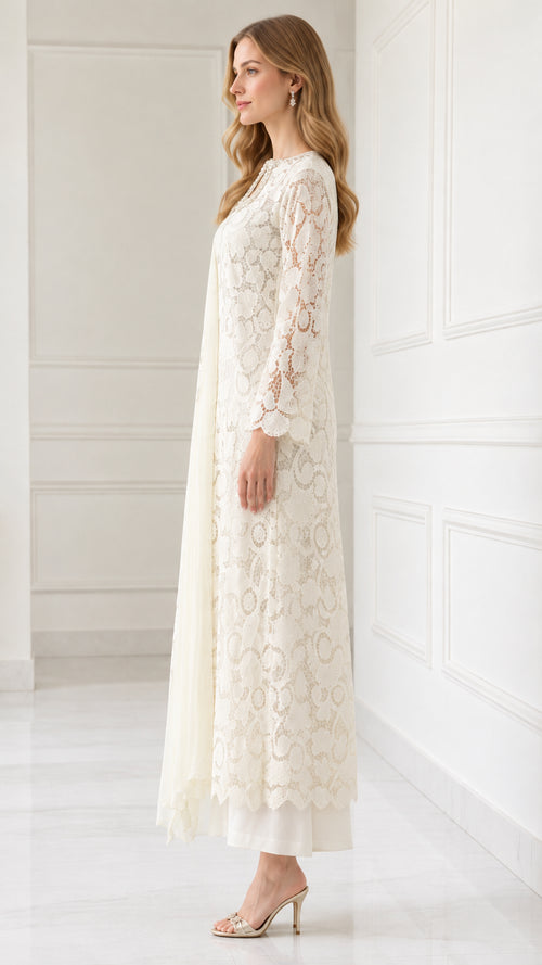 Side profile view of Ivory floral lace tunic set showing sleeve and drape detail