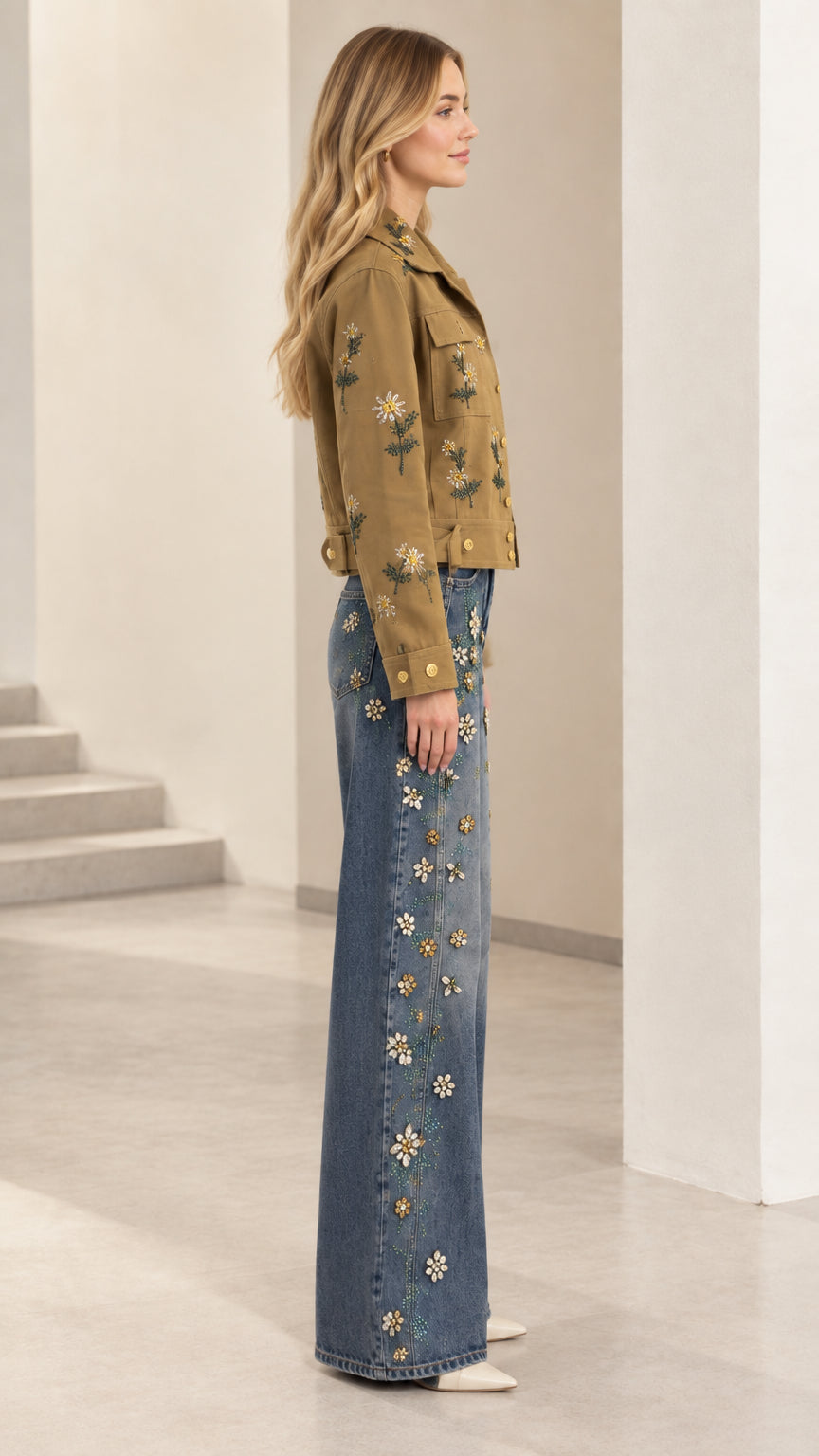 Side profile view of camel floral embroidered cropped jacket