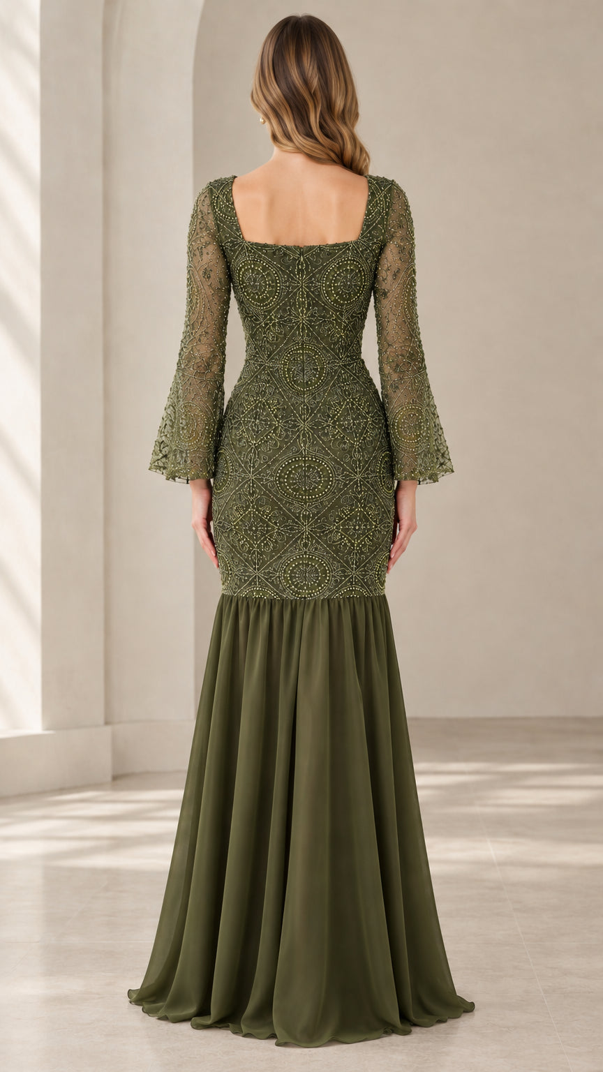 Back view of olive green beaded gown showing square back and flowing mermaid skirt