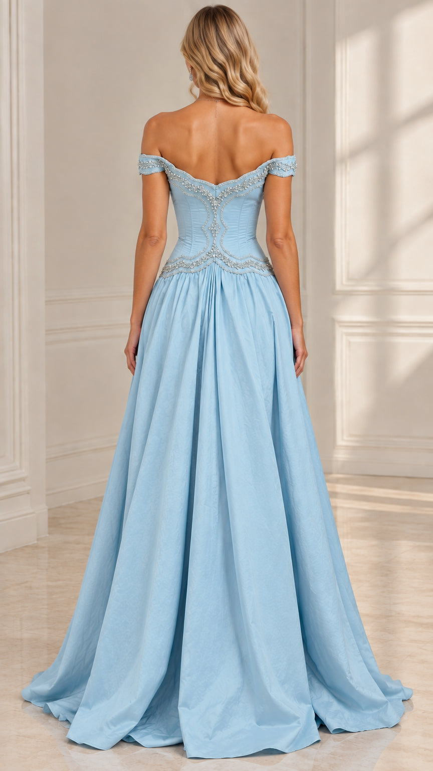 Back view of model showing open back and voluminous skirt of sky blue evening gown