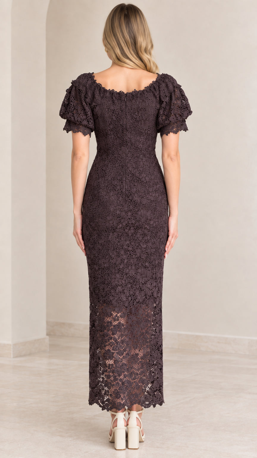 Back view of woman wearing dark plum lace maxi dress showing zipper closure