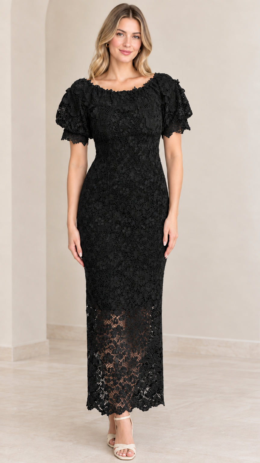Front view of woman wearing black floral lace puff sleeve maxi dress