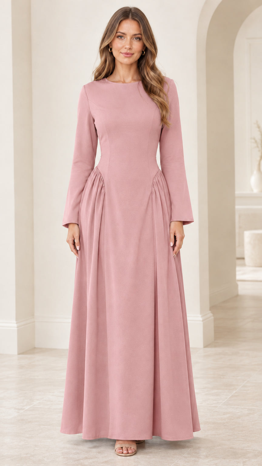 Front view of woman wearing dusty pink long sleeve formal evening gown