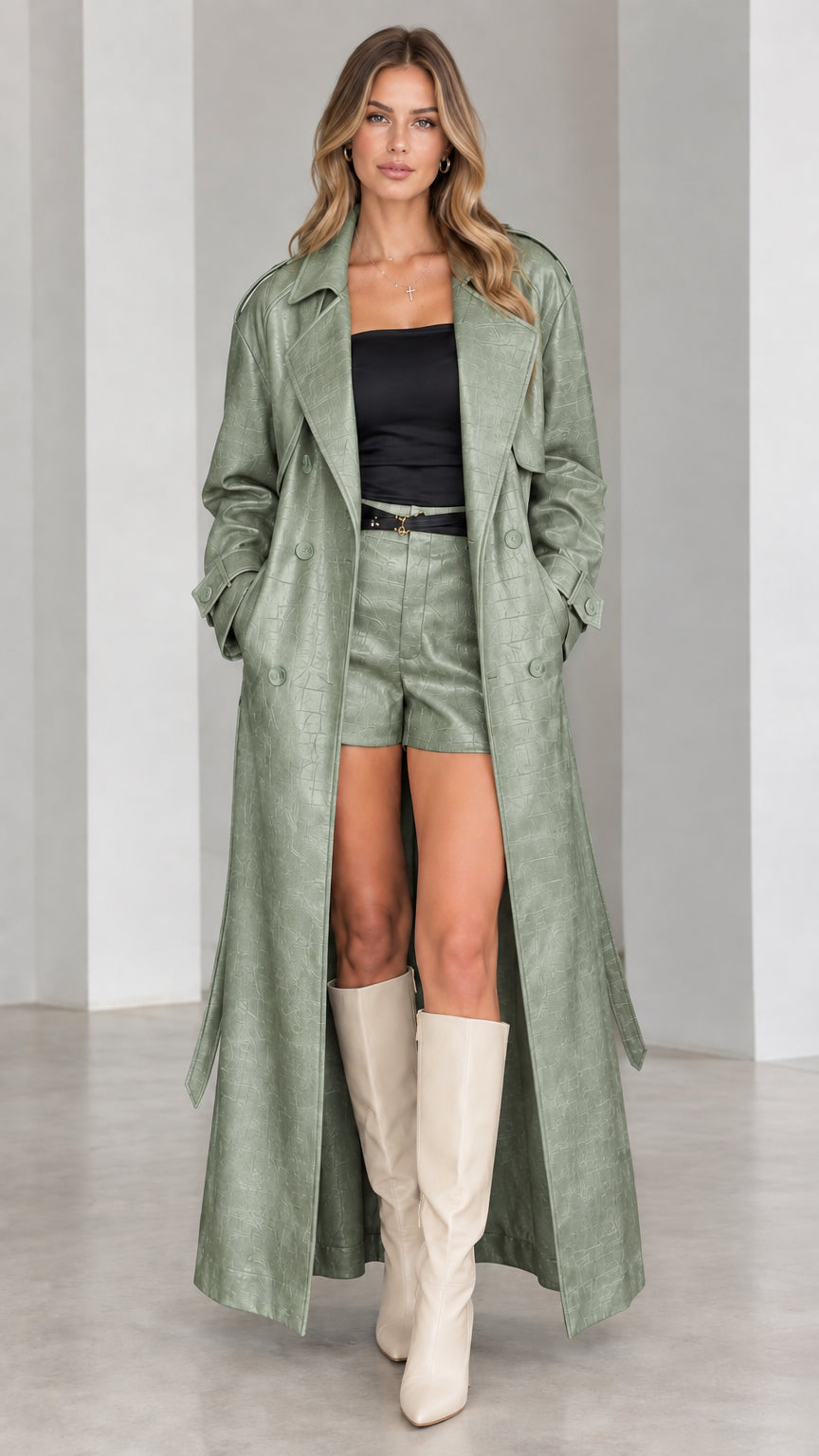 Full-length front view of sage green croc-embossed maxi trench coat