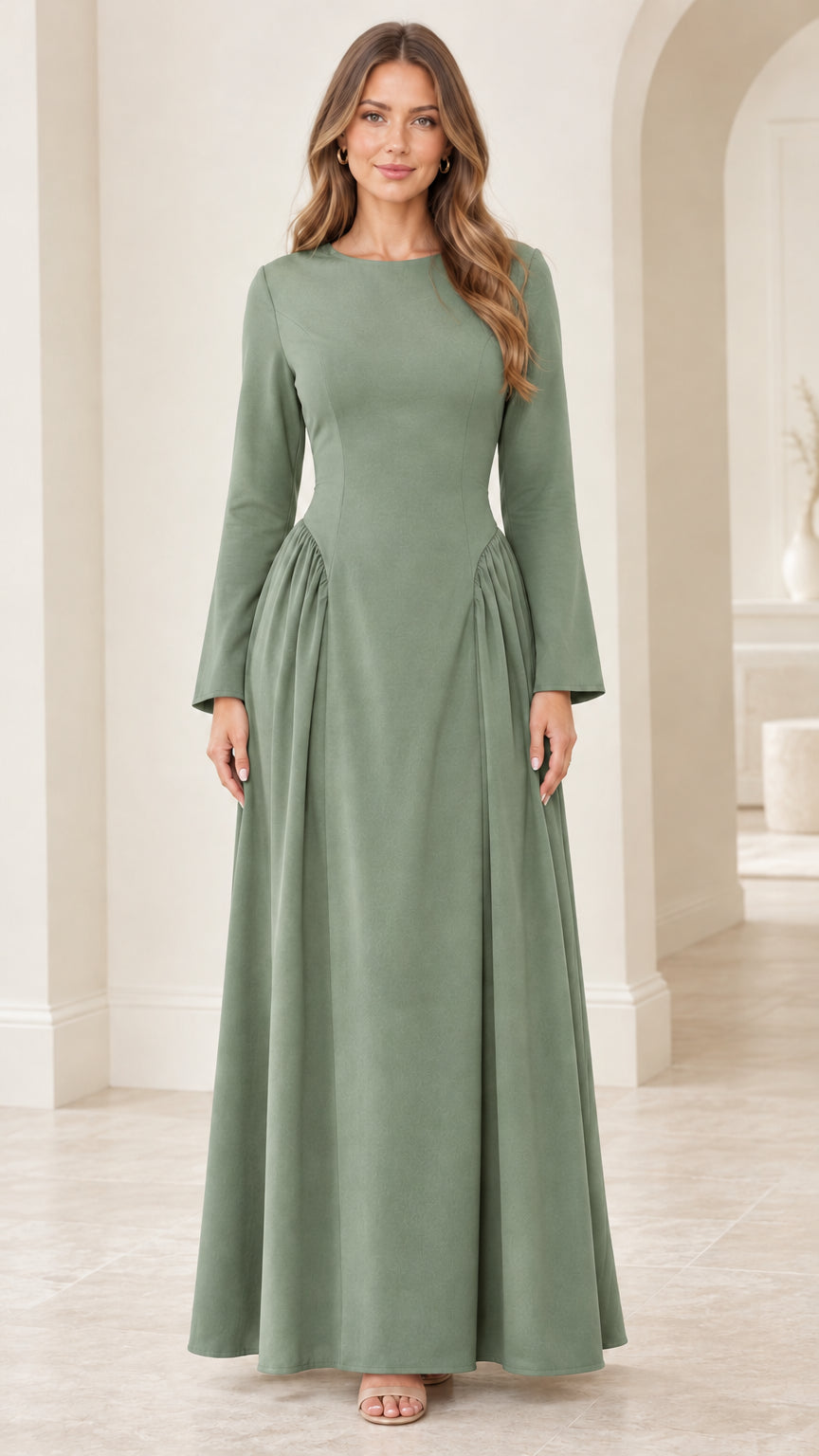Front view of woman wearing sage green modest long sleeve maxi dress
