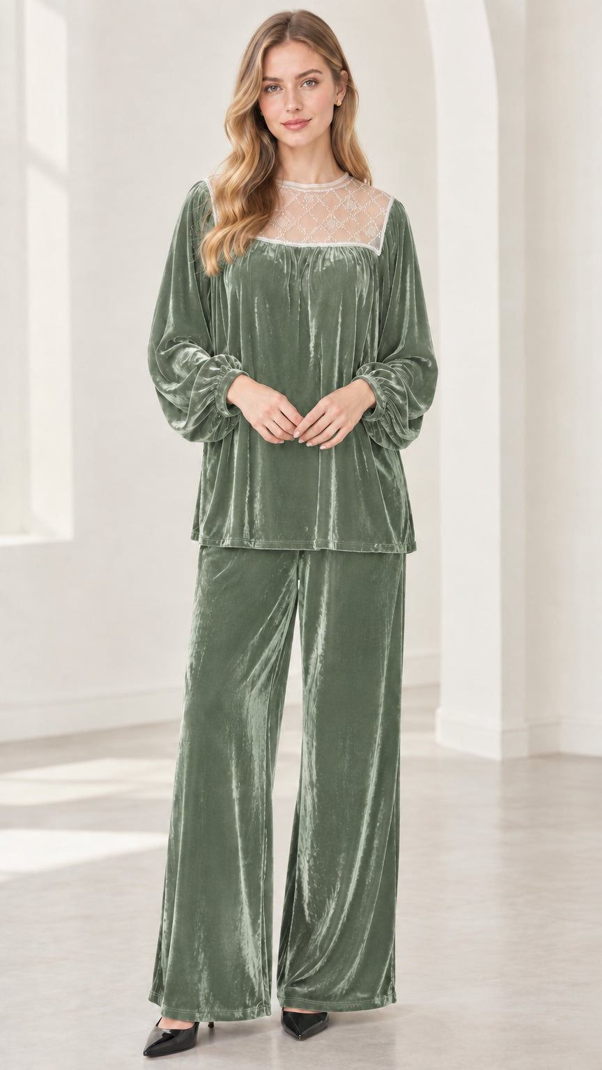 Full-length view of model wearing sage green velvet two-piece pant set