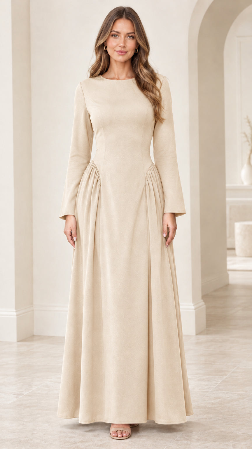 Front view of woman wearing champagne beige long sleeve evening maxi dress