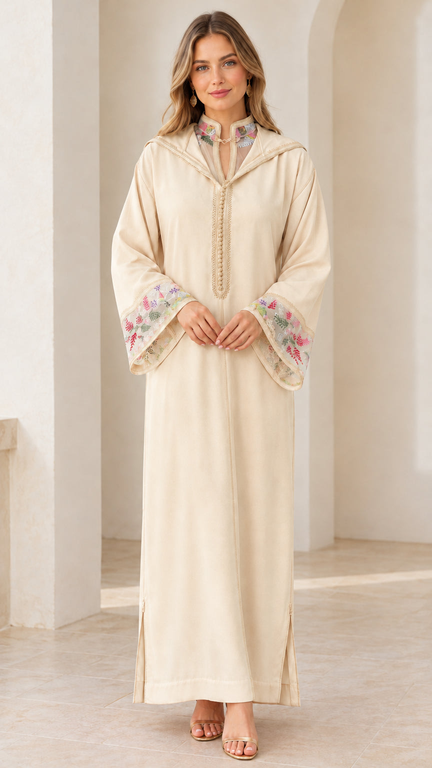Model wearing cream beige embroidered hooded djellaba maxi dress